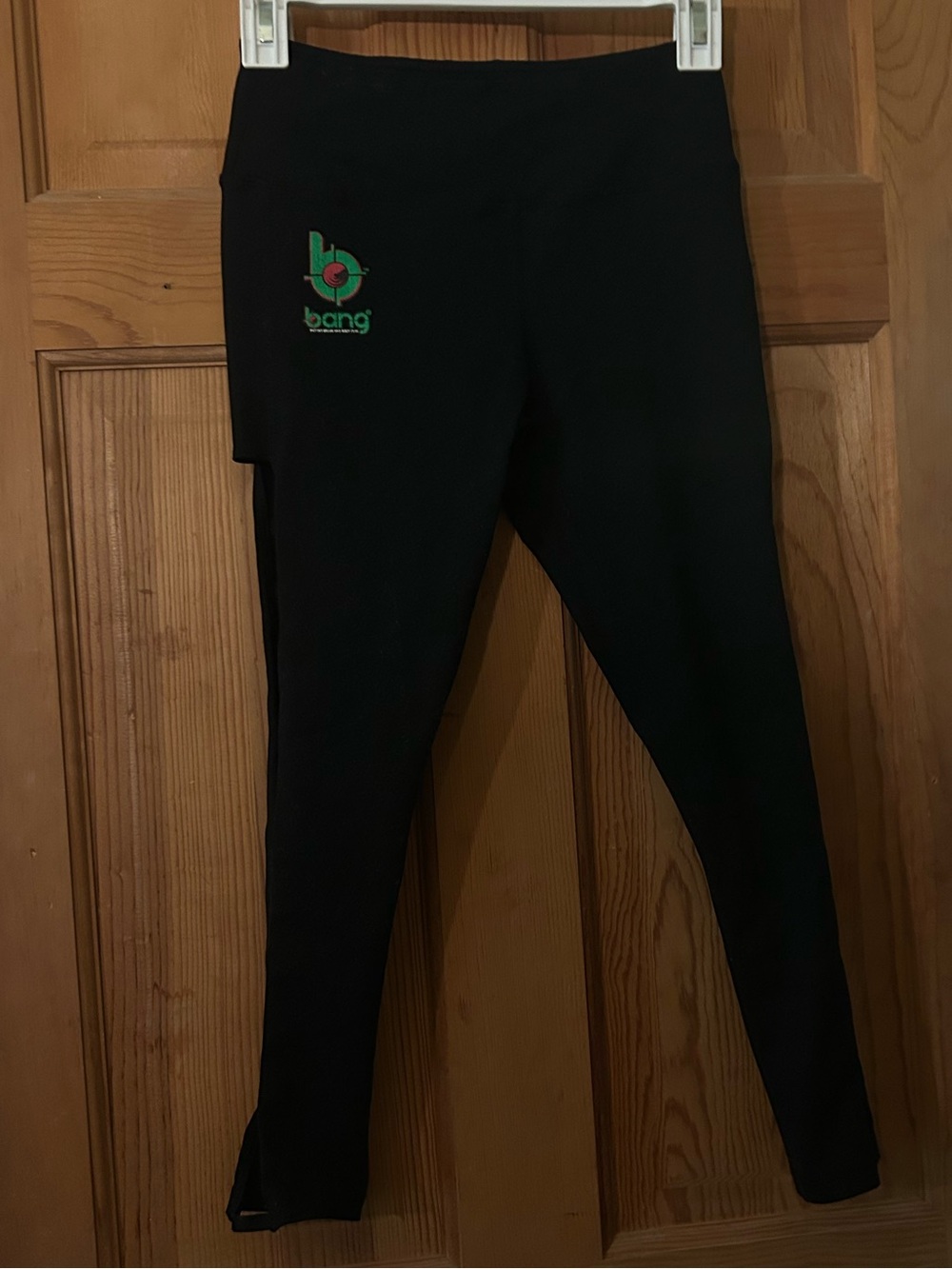 Black Women's Leggings with Green Bang Energy Logo